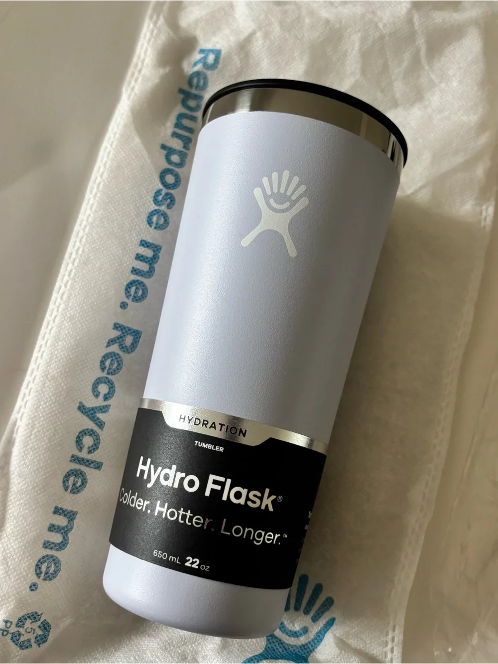 Hydro Flask 22 oz tumbler in light blue with silver lid & medium press in lid